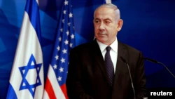 Israeli Prime Minister Benjamin Netanyahu looks at U.S. Secretary of State Anthony Blinken (not pictured) during a joint news conference in Jerusalem, May 25, 2021.